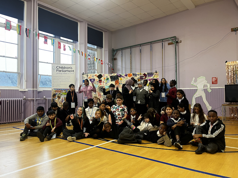 Members of Children's Parliament gather for a photograph. Anti racism education (Children's Parliament 2024)